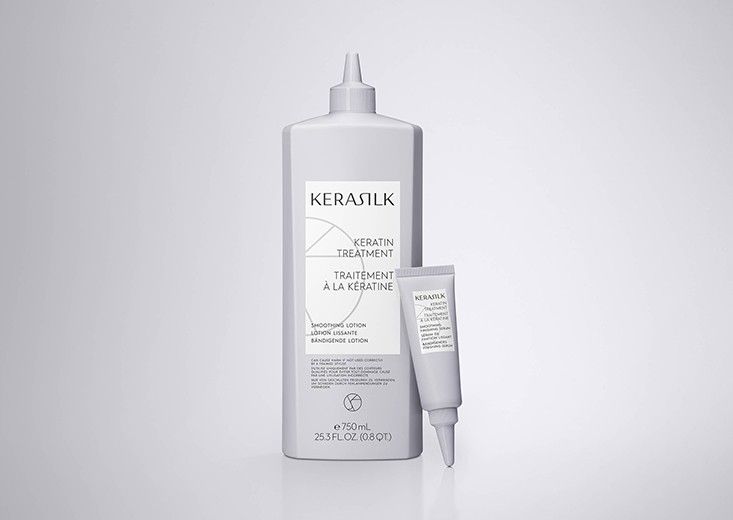 Kerasilk product photo: the Keratin Treatment bottle beside its finishing serum